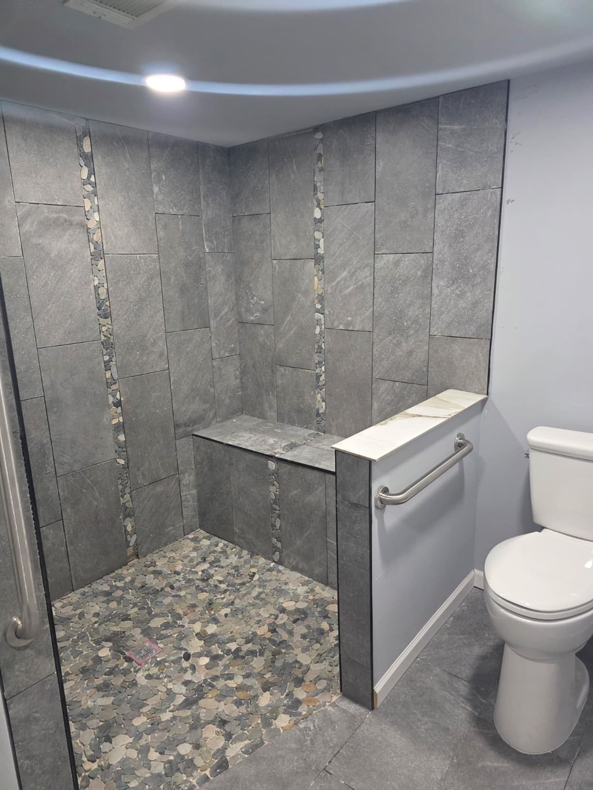 Bathrooms & custom tile project by Natural State