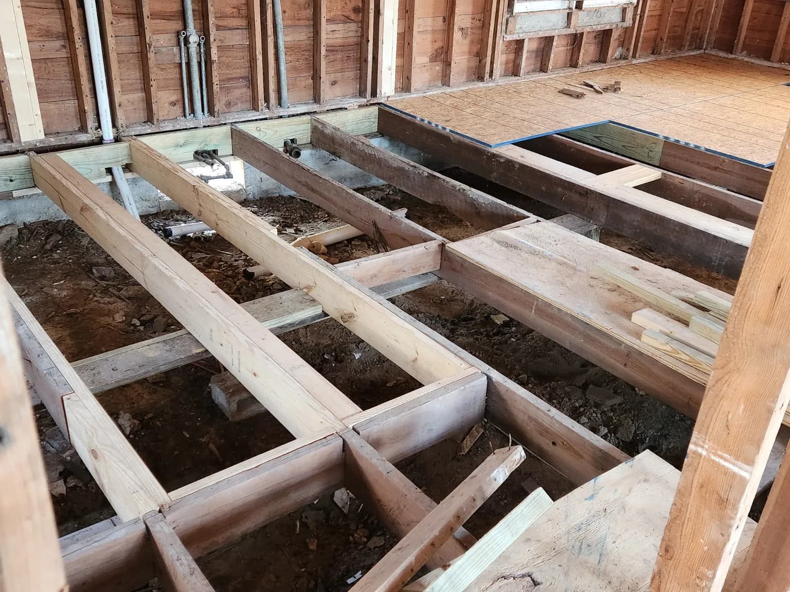 Floor framing rebuild during a renovation